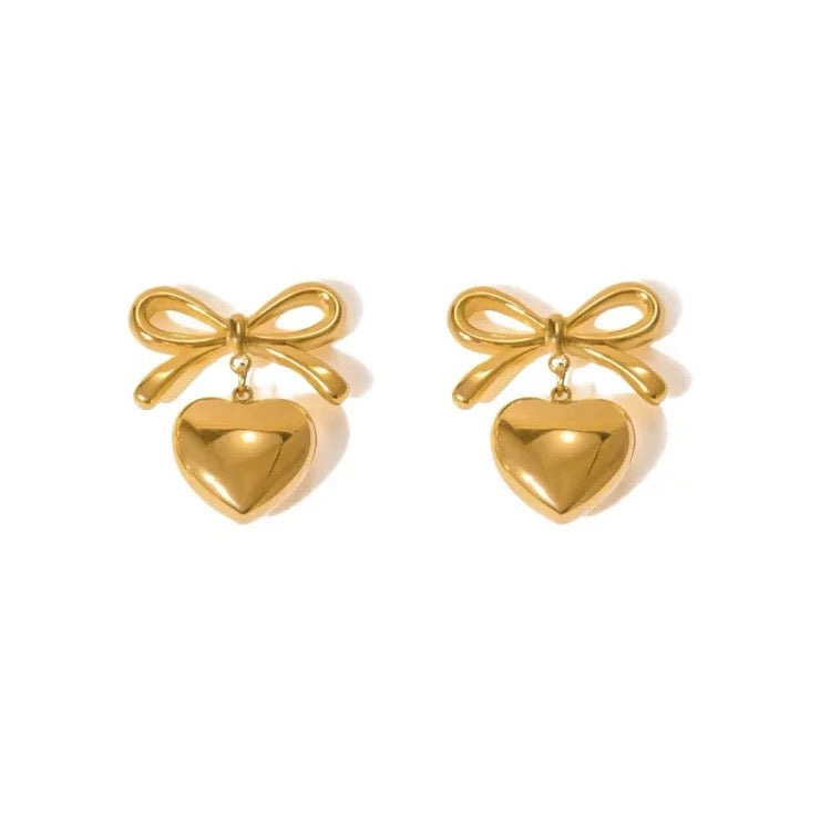 Bow earring with pendant heart