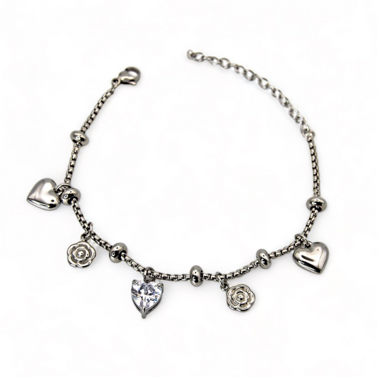 Bracelet with flower and heart pendants